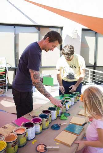 Community members helped create a mural with James Marshall (a.k.a. Dalek). Photo: Chris Loomis